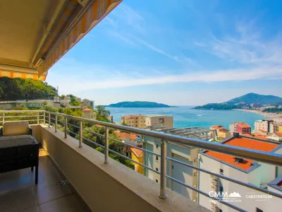 Apartment with panoramic seaview and garage space in Rafailovici