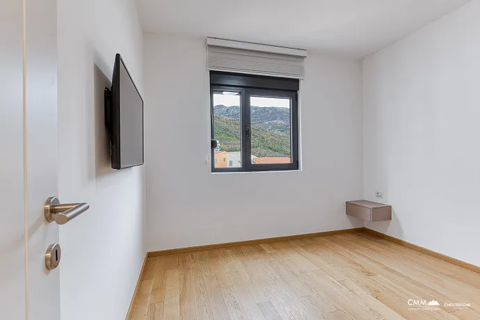 Luxury Two-Bedroom Apartment in Bečići – Panoramic Sea View of Sveti Stefan