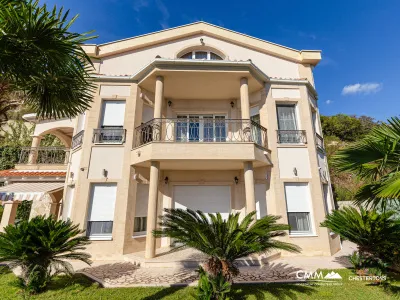 Elegance and serenity in a luxurious villa with natural views.