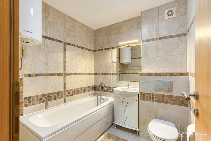 FOR SALE: SPACIOUS, FULLY FURNISHED APARTMENT IN BUDVA WITH GARAGE AND TESLA CHARGER