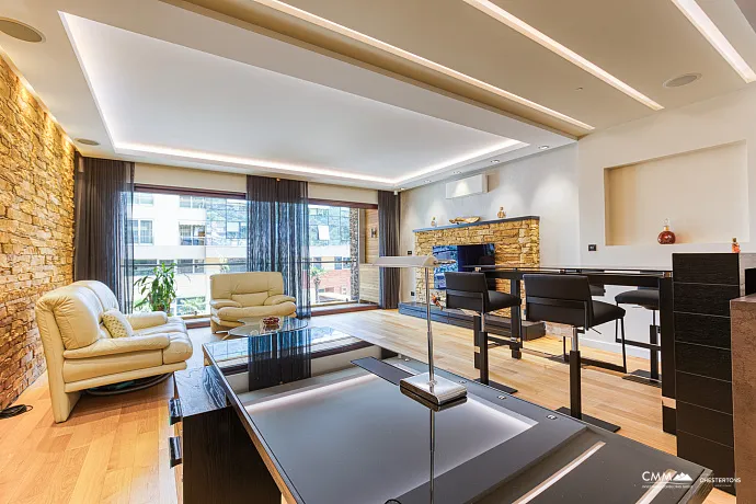 An elegant two-bedroom apartment with an exclusive design in the heart of Budva.