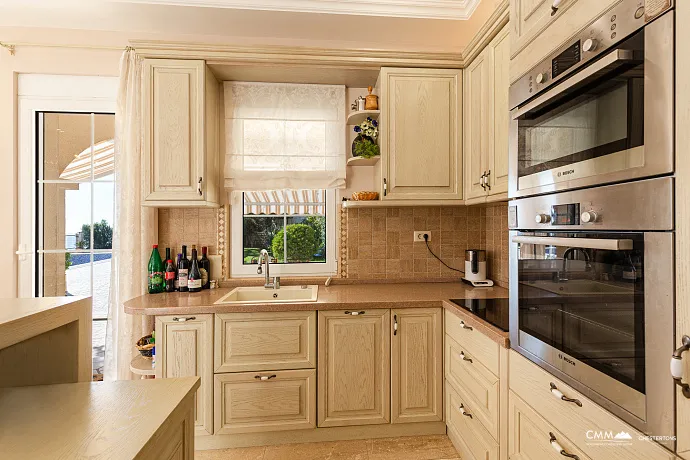 Elegance and serenity in a luxurious villa with natural views.