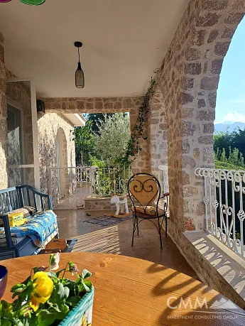 Stone house with pool surrounded by nature in a beautiful rustic village