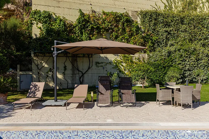 Elegance and serenity in a luxurious villa with natural views.