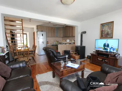 Stone house with a restaurant on the waterfront in Prcanj