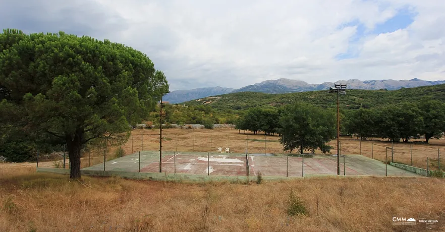 House with golf course and tennis court