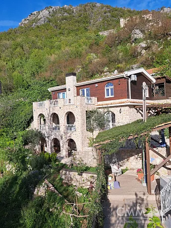 Stone house with pool surrounded by nature in a beautiful rustic village