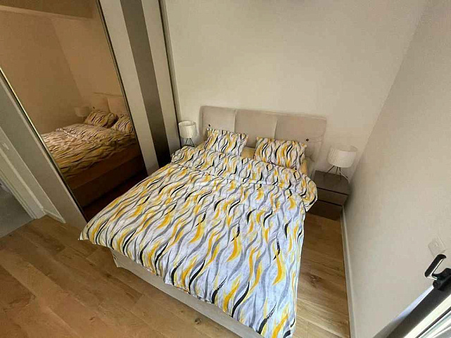 One bedroom apartment in a newly built complex in Bečići with a swimming pool on the roof — photo 7