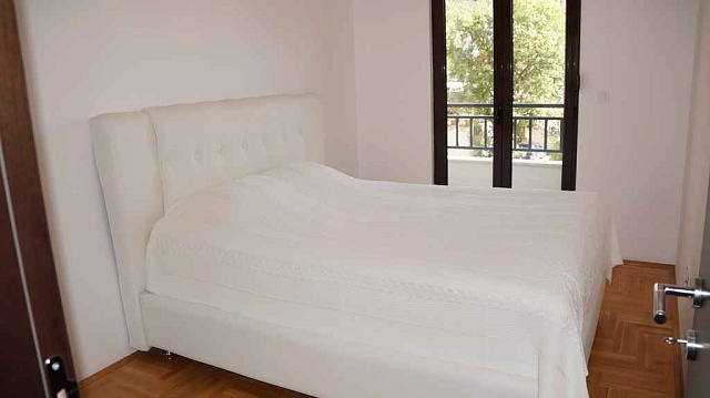 A new apartment in Budva — photo 5