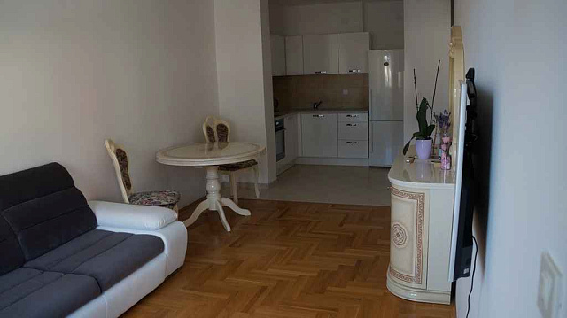 A new apartment in Budva — photo 7