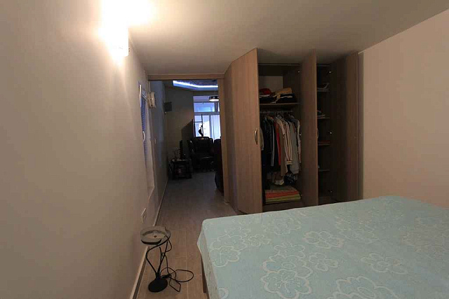 Apartment with a studio inside and a courtyard — photo 15