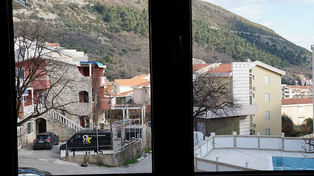 A new apartment in Budva — photo 11