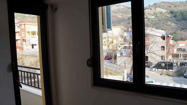 A new apartment in Budva — photo 10