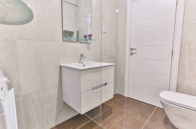 Three-bedroom apartment in Becici, 86m² — photo 10