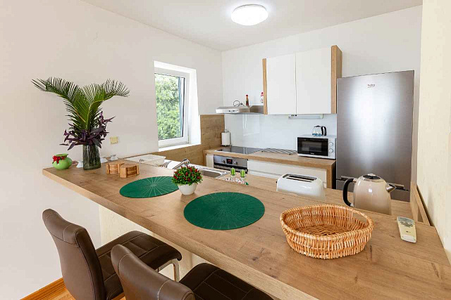 Spacious duplex apartment with sea view in Sveti Stefan — photo 6