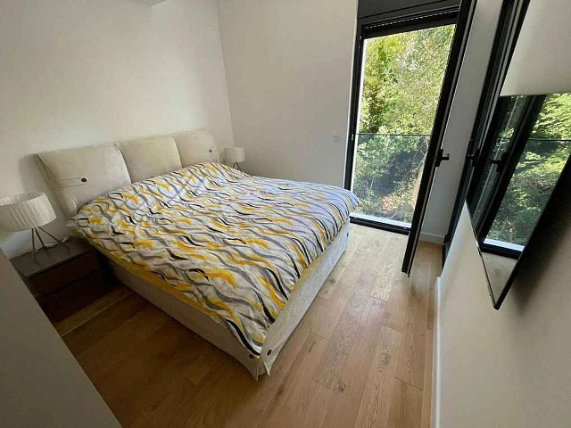 One bedroom apartment in a newly built complex in Bečići with a swimming pool on the roof — photo 6