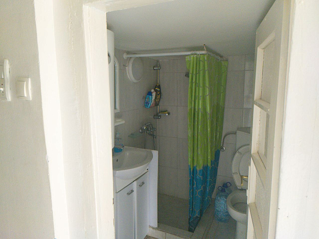 House with two apartments in Becici — photo 13