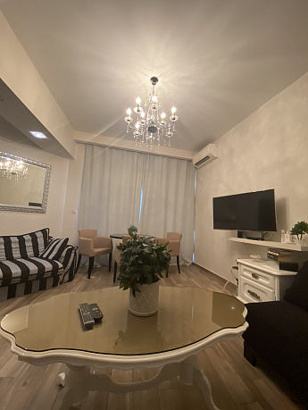 Two-bedroom apartment in the center of Budva with a garage 