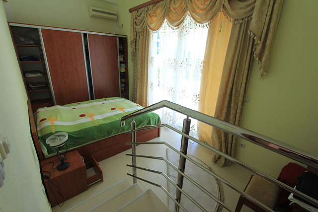 Apartment with a studio inside and a courtyard — photo 10