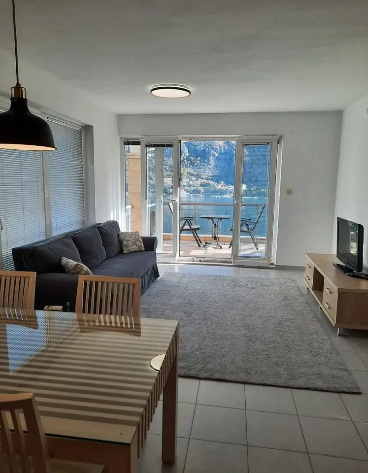 6929  two-bedroom apartment, 73 m², in a complex with a swimming pool in Muo, with a view of the Bay of Kotor