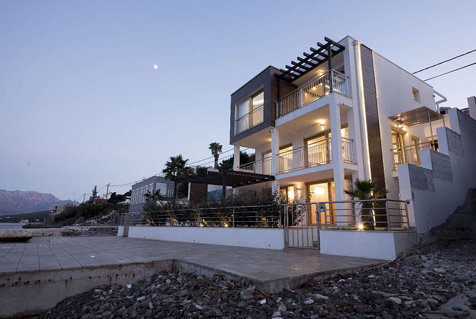 Modern villa on a step from the sea