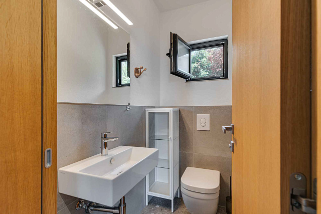 Modern three-bedroom apartment in the centre of Tivat with sea views — photo 25