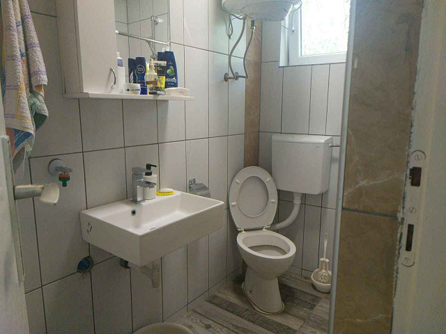 House with two apartments in Becici — photo 11