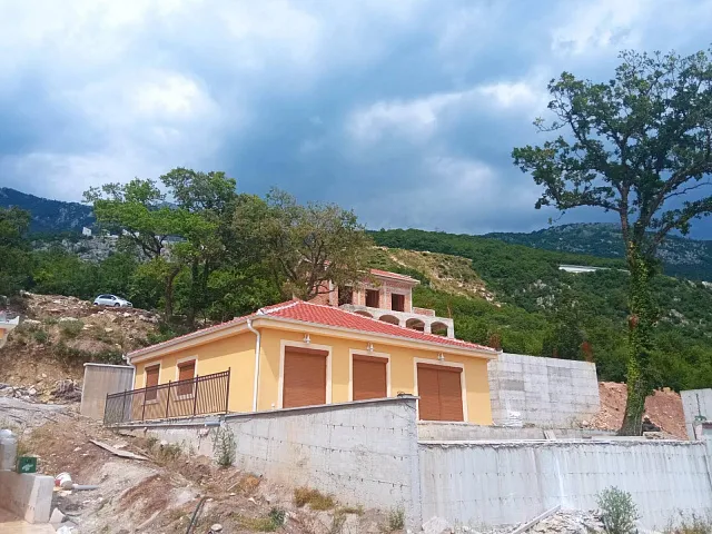 A complex of houses with a swimming pool near Budva — photo 4