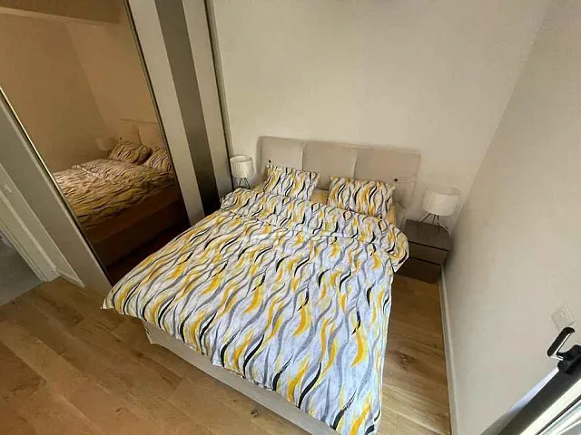 One bedroom apartment in a newly built complex in Bečići with a swimming pool on the roof — photo 7
