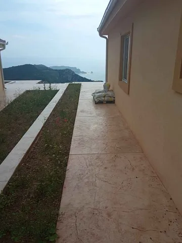 A complex of houses with a swimming pool near Budva — photo 6