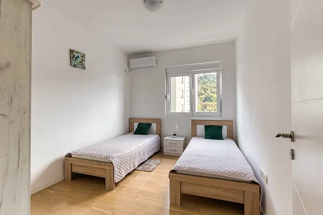A bright and comfortable 65 m² apartment in Rafailovići — photo 15