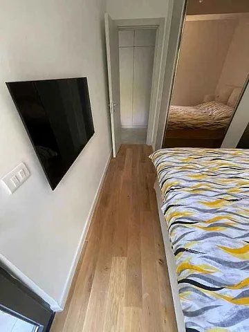 One bedroom apartment in a newly built complex in Bečići with a swimming pool on the roof — photo 8