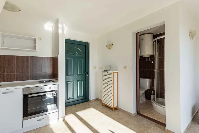 57 m² house with one bedroom, two floors, and a beautiful plot with sea views in Mrčevac. — photo 12
