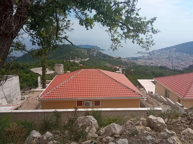 A complex of houses with a swimming pool near Budva
