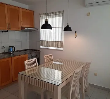 6929  two-bedroom apartment, 73 m², in a complex with a swimming pool in Muo, with a view of the Bay of Kotor — photo 2